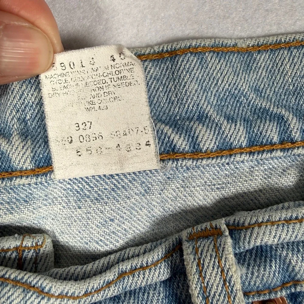 Vintage 90s Levis 550 Relaxed Fit Tapered Jeans Light Wash 38x28 Made in USA